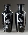 A pair of Chinese black-ground enamelled 'magpie and prunus' vases