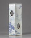 A blue and white hat stand