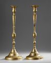 A PAIR OF LARGE QAJAR ENGRAVED BRASS CANDLESTICKS, IRAN, 19TH CENTURY