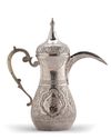 A SILVER COFFEE POT (DALLAH), KUWAIT, CIRCA 1950
