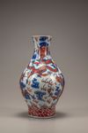 An iron-red-decorated blue and white trilobed vase