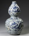 A CHINESE BLUE AND WHITE DOUBLE GOURD VASE, MING DYNASTY (1368-1644) OR LATER