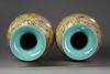 A PAIR OF LARGE CHINESE YELLOW-GROUND FAMILLE  ROSE VASES