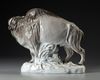 A PORCELAIN SCULPTURE OF A BISON, 20TH CENTURY