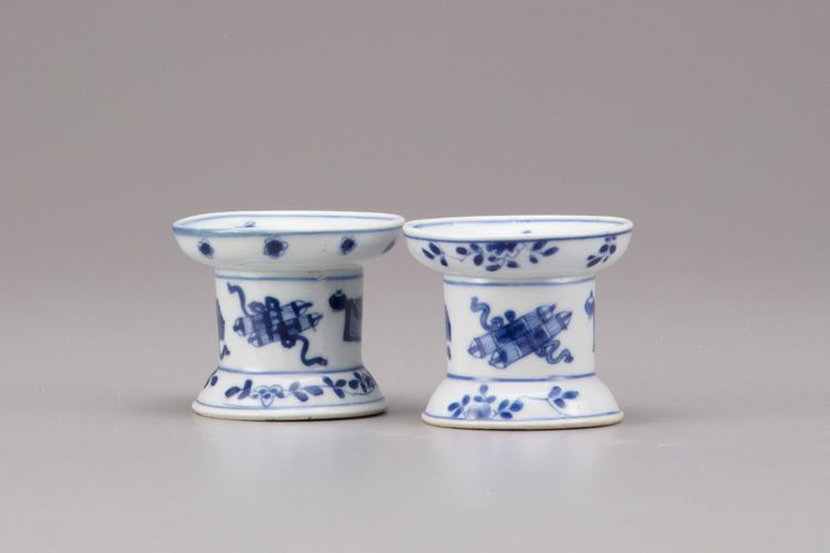 A pair of blue and white porcelain pounces