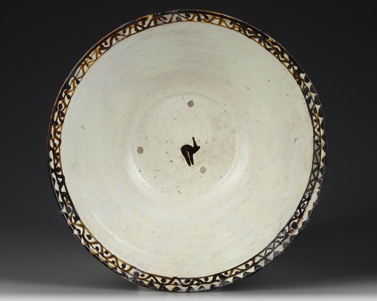 A NISHAPUR  POTTERY BOWL, PERSIA, 9TH-10TH CENTURY
