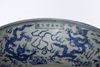 A LARGE CHINESE BLUE AND WHITE DRAGONS DISH, MING DYNASTY (1368-1644) OR LATER