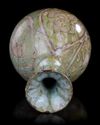 A QAJAR POTTERY VASE, 19TH CENTURY