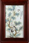 A CHINESE FRAMED FAMILLE ROSE PLAQUE