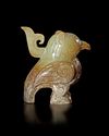 A GREENISH-YELLOW JADE CARVING OF A BIRD, CHINA, SHANG DYNASTY