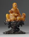 A Chinese soapstone carving of a Luohan