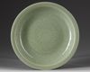 A CHINESE CELADON GLAZED DISH, POSSIBLY MING DYNASTY