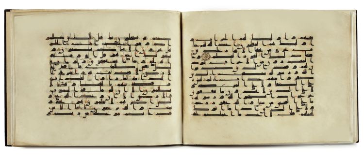 A BOUND GROUP OF TWENTY-NINE LEAVES FROM SEVEN SURAHS OF A DISPERSED MANUSCRIPT OF THE QURAN WRITTEN IN KUFIC SCRIPT ON VELLUM, NEAR EAST OR NORTH-AFRICA, 9TH CENTURY