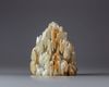 A Chinese celadon jade Shakyamuni