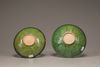 Two emerald-green-glazed bowls