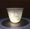 A Chinese white-glazed anhua-decorated 'dragon' cup