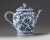A Chinese blue and white moulded teapot