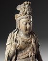 A LARGE CHINESE POLYCHROME-DECORATED WOOD CARVING OF GUANYIN, POSSIBLY SONG-YUAN DYNASTY
