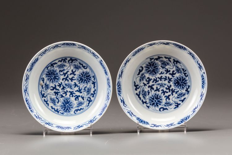 A pair of Chinese blue and white 'lotus' dishes