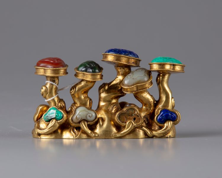 A CHINESE GILT BRONZE HARDSTONE INLAID-BRUSK REST, CHINA, 19TH CENTURY