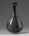 A CHINESE BLACK GLAZED RUST-SPLASHED PEAR-SHAPED VASE, SONG-STYLE