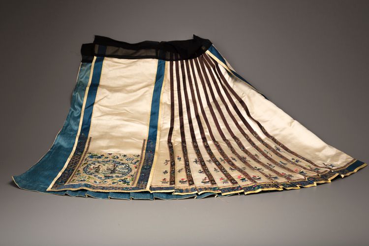 Three embroidered apron skirt panels