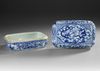 A CHINESE BLUE AND WHITE RECTANGULAR DRAGON BOX AND COVER, QING DYNASTY (1644–1911)