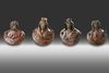 FOUR ROMAN BRONZE APPLIQUES, 1ST-2ND CENTURY AD