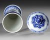 A CHINESE BLUE AND WHITE BELL-SHAPED COVERED VASE, QING DYNASTY (1644-1911)