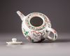 A Chinese famille verte moulded teapot and cover