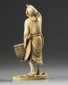 An ivory Japanese figure of a fisherman