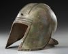 A GREEK BRONZE ILLYRIAN HELMET, CIRCA 6TH-5TH CENTURY B.C.
