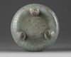 A Chinese celadon crackle-glazed tripod censer