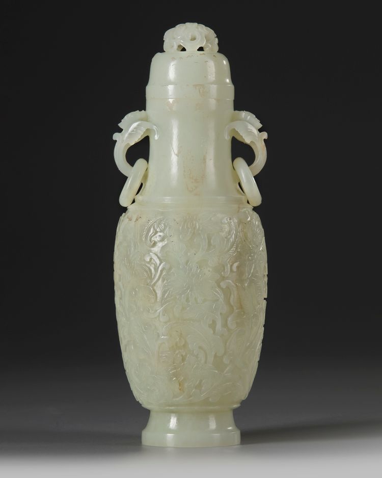 A CHINESE CARVED JADE VASE AND COVER, QING DYNASTY (1644-1911)