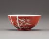 A Chinese coral-ground reserve decorated 'bamboo' bowl