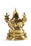 A Sino-Tibetan gilt bronze figure of a Lama