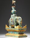 A CHINESE JADE AND CLOISONNÉ CAPARISONED ELEPHANT ON A CLOISONNÉ BASE, QING DYNASTY (1644-1911)