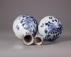 A pair of Chinese blue and white ‘peony’ bottle vase