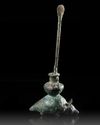 A BACTRIAN BRONZE KOHL VESSEL IN THE FORM OF A MOUSE, CIRCA EARLY 1ST CENTURY B.C.