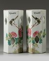 A pair of Chinese famille rose 'bird and flower' hexagonal hat stands