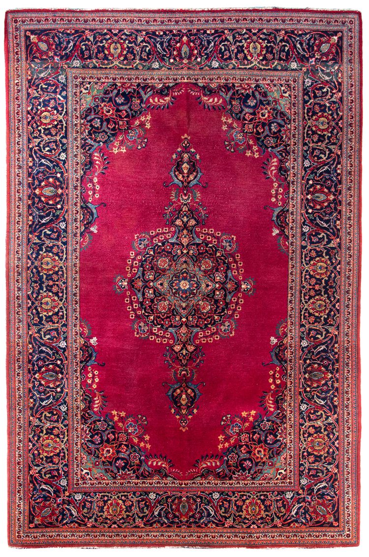 A KASHAN RUG WITH SILK, CIRCA 1920