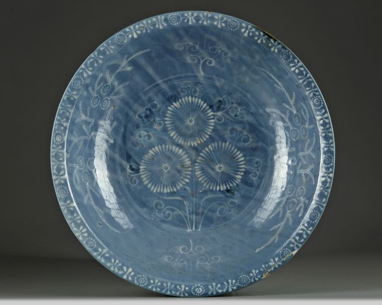 A Chinese blue-ground slip-decorated Zhangzhou ‘Swatow’ dish