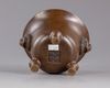 A Chinese bronze tripod censer