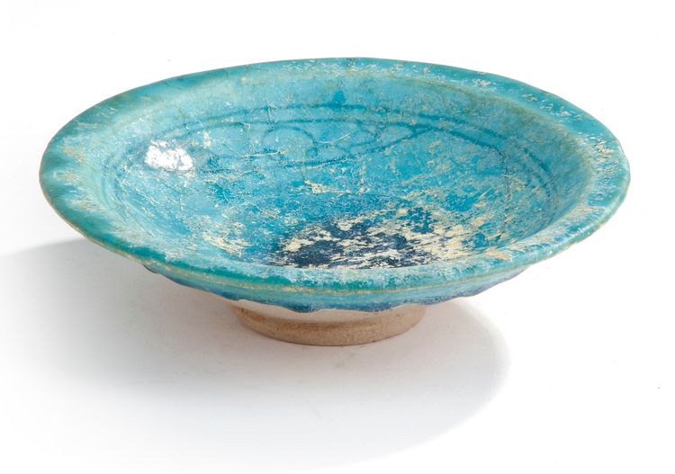 A TURQUOISE GLAZED POTTERY BOWL