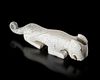 A CHINESE WHITE JADE TIGER, SHANG DYNASTY (CIRCA 1600–1046 BC)
