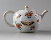 A Chinese famille verte 'butterfly' teapot and cover