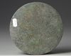 A CHINESE CIRCULAR BRONZE MIRROR, TANG DYNASTY (618-907 AD)
