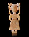 A CHINESE JADE FEMALE FIGURE,  SHANG DYNASTY (c. 1600–1046 BCE)