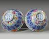 A pair of Chinese famille rose bowls