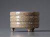 A Chinese crackle-glazed tripod censer